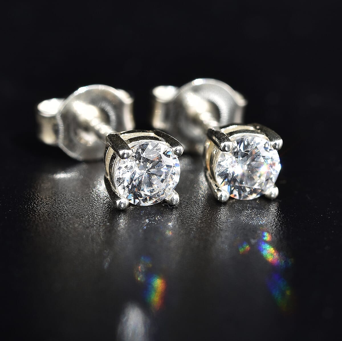 White Moissanite Solitaire Stud Earrings in Platinum Over Sterling Silver 0.50 ctw image number 1