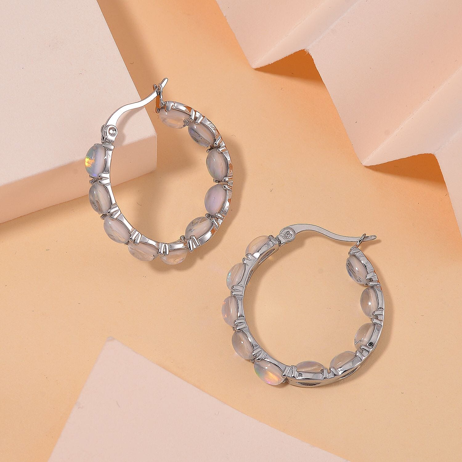 White Magic Simulated Opal Inside Out Hoop Earrings in Stainless Steel