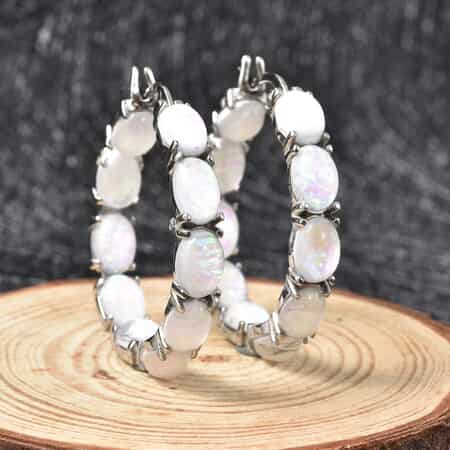White Magic Simulated Opal Inside Out Hoop Earrings in Stainless Steel image number 1