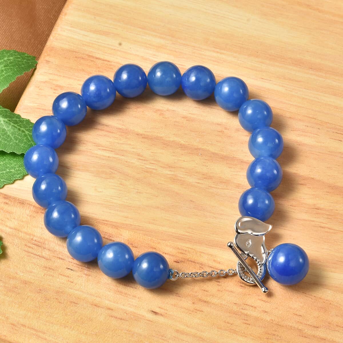 Blue Jade 10-12mm Beaded Charm Bracelet in Rhodium Over Sterling Silver (6.50 In) 122.25 ctw image number 1