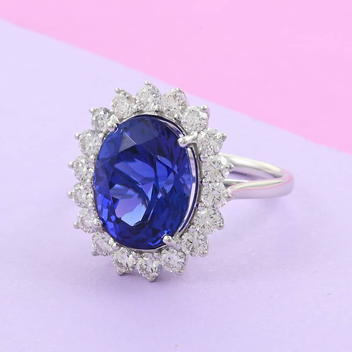 DOORBUSTER RHAPSODY 950 Platinum AAAA Tanzanite and Diamond E-F VS Oval Shape Halo Ring 8 Grams 11.75 ctw image number 1
