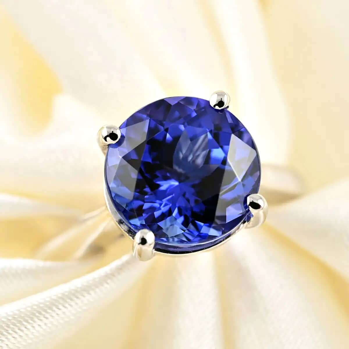Certified and Appraised Rhapsody 950 Platinum AAAA Tanzanite and E-F VS Diamond Accent Solitaire Ring (Size 6.0) 7.92 Grams 5.00 ctw image number 1