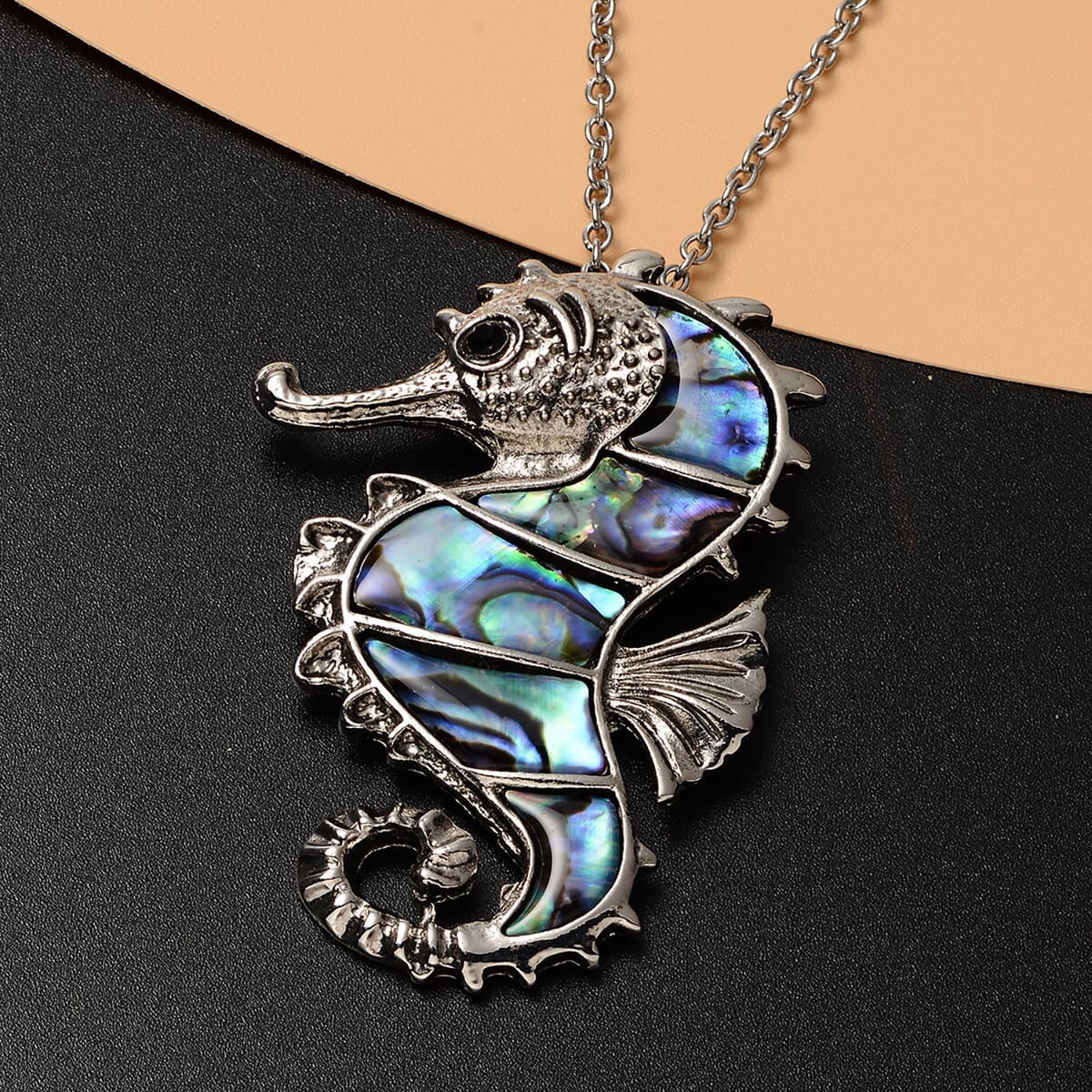 Abalone Shell and Black Austrian Crystal Seahorse Pendant in Silvertone with Stainless Steel Necklace 20-22 Inches image number 1