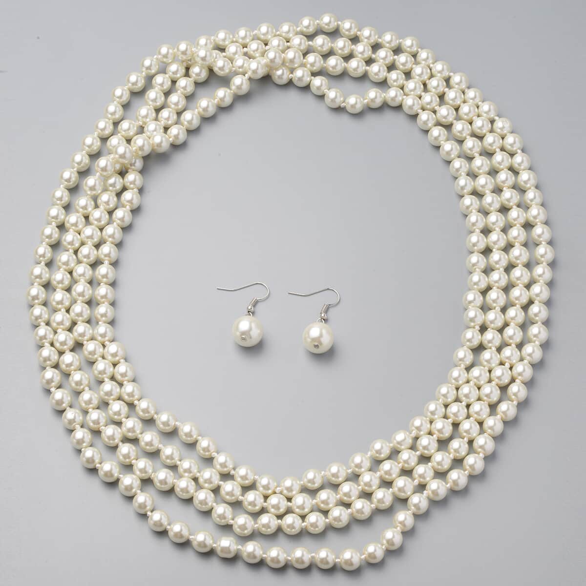 Simulated White Pearl Beaded Endless Necklace and Drop Earrings in Stainless Steel image number 0