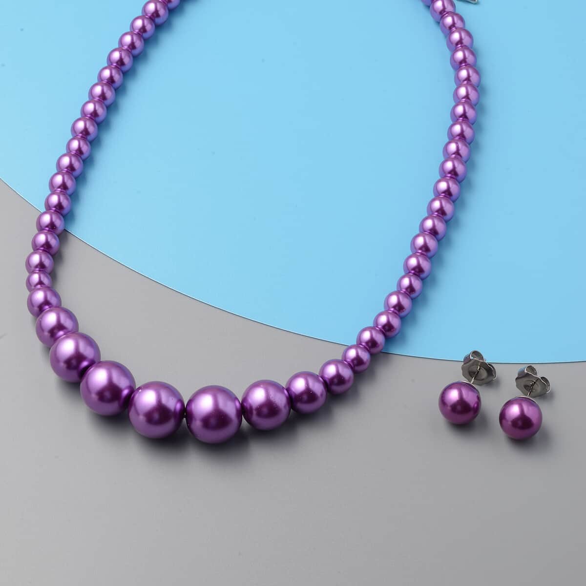 Set of 2 Simulated Purple Pearl Necklace 20-22 Inches and Earrings in Silvertone and Stainless Steel image number 1