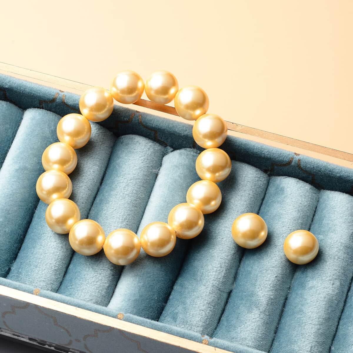 Golden Shell Pearl Stretch Bracelet and Stud Earrings in Rhodium Over Sterling Silver image number 1