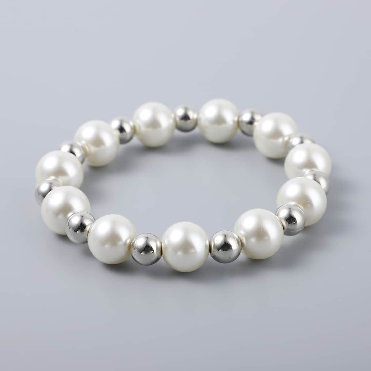 Simulated White Pearl and Resin Stretch Bracelet and Earring and Necklace 21-23 Inches in Silvertone & Stainless Steel image number 5