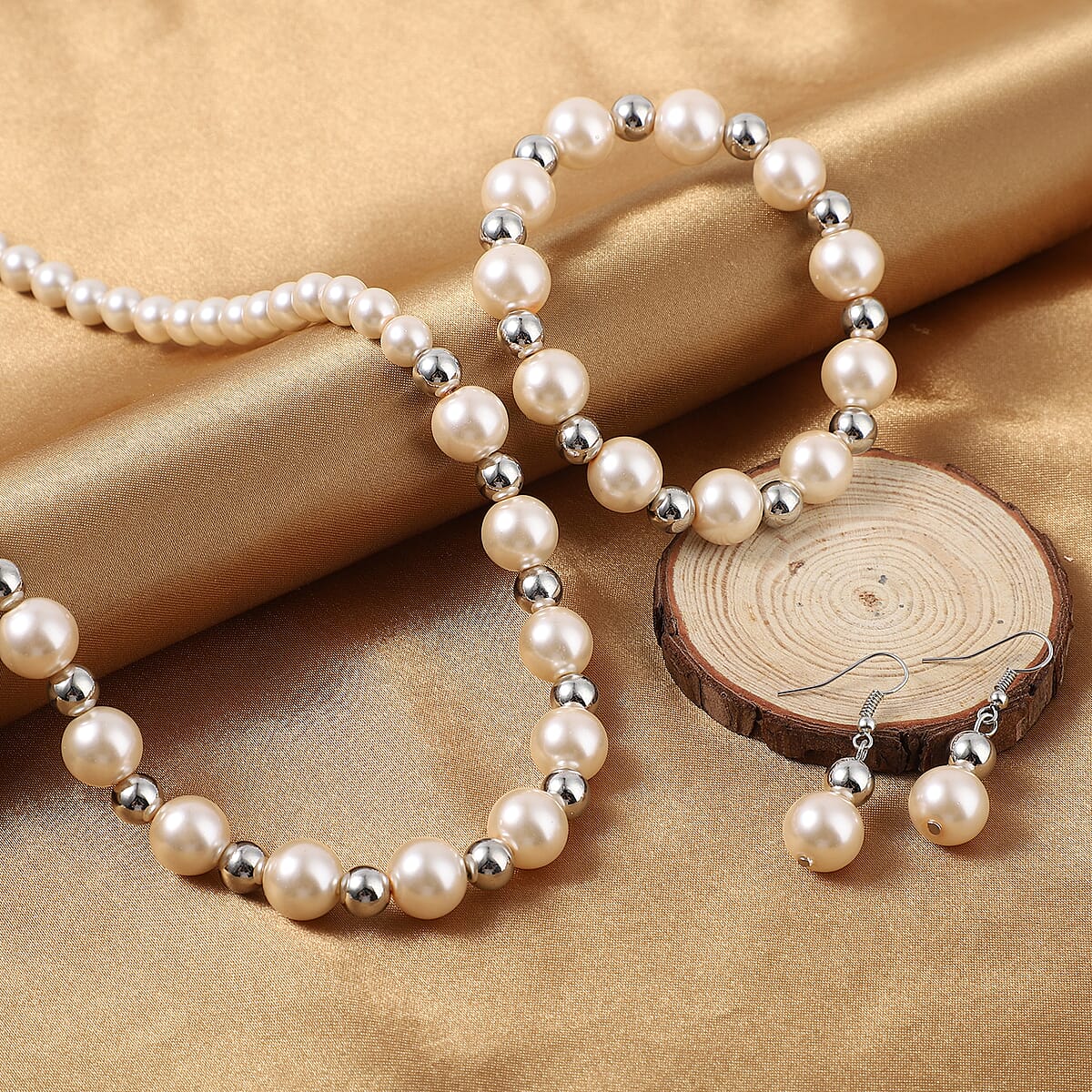 Simulated Peach Pearl and Resin Stretch Bracelet and Earrings and Necklace 21 Inches in Silvertone & Stainless Steel image number 1