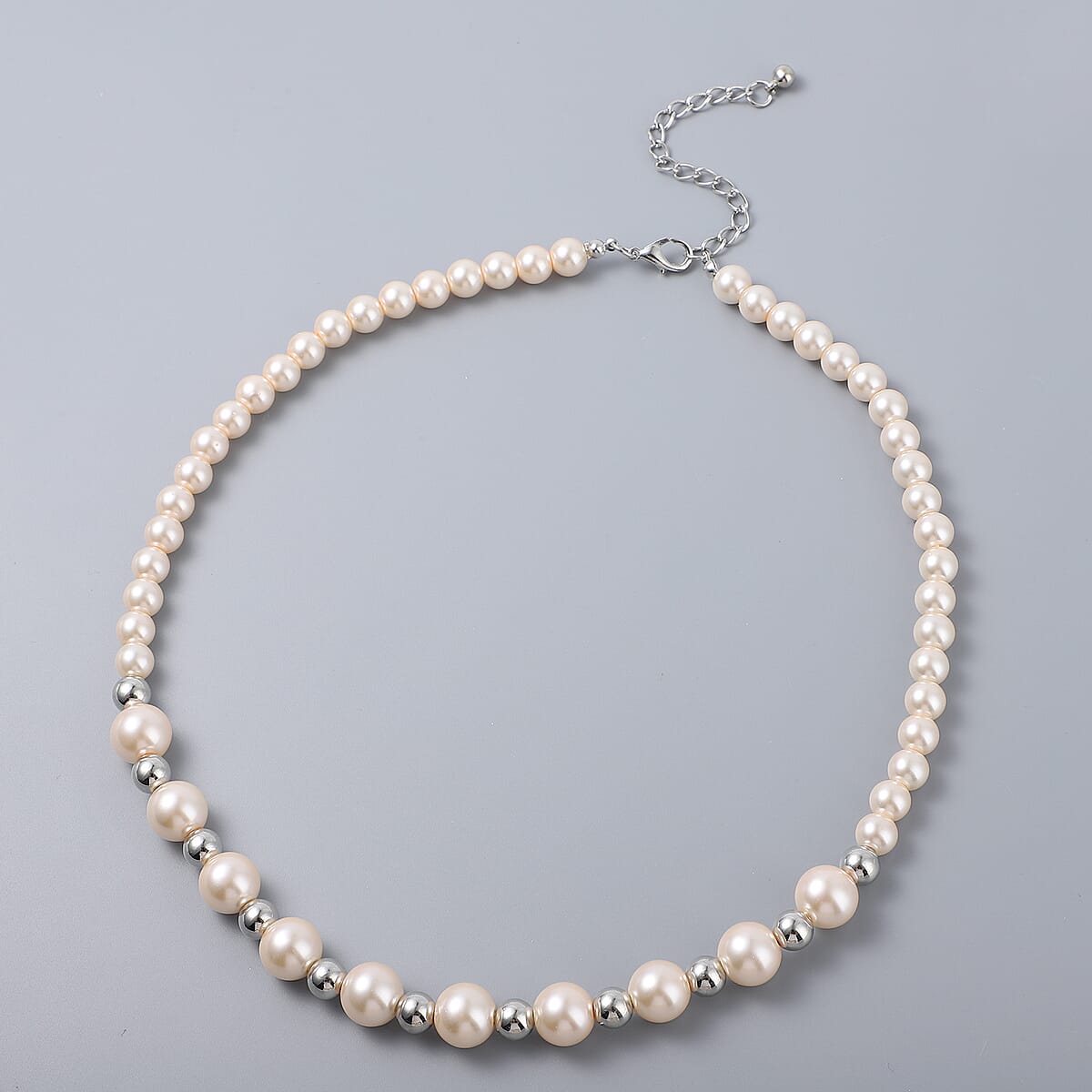 Simulated Peach Pearl and Resin Stretch Bracelet and Earrings and Necklace 21 Inches in Silvertone & Stainless Steel image number 2