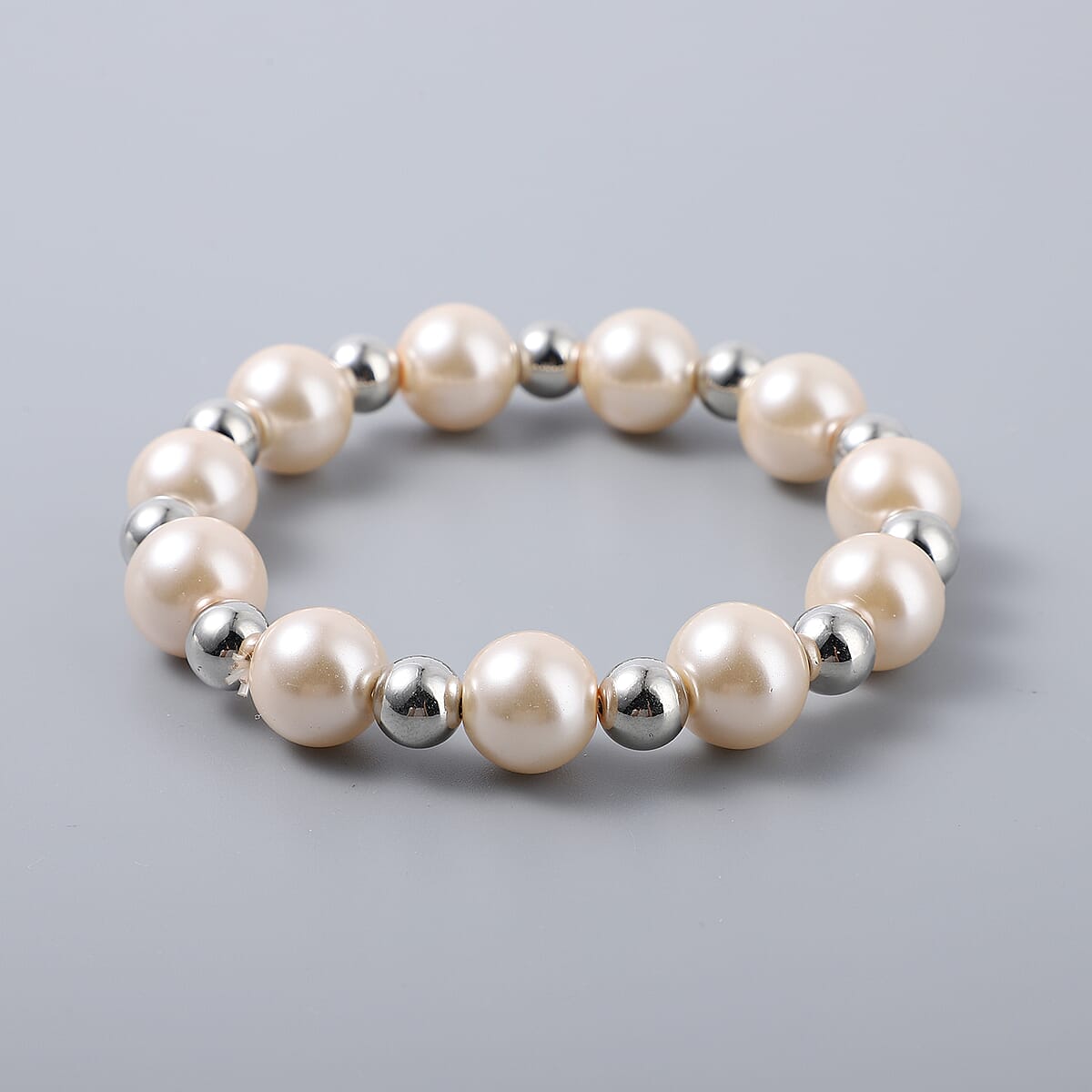 Simulated Peach Pearl and Resin Stretch Bracelet and Earrings and Necklace 21 Inches in Silvertone & Stainless Steel image number 5