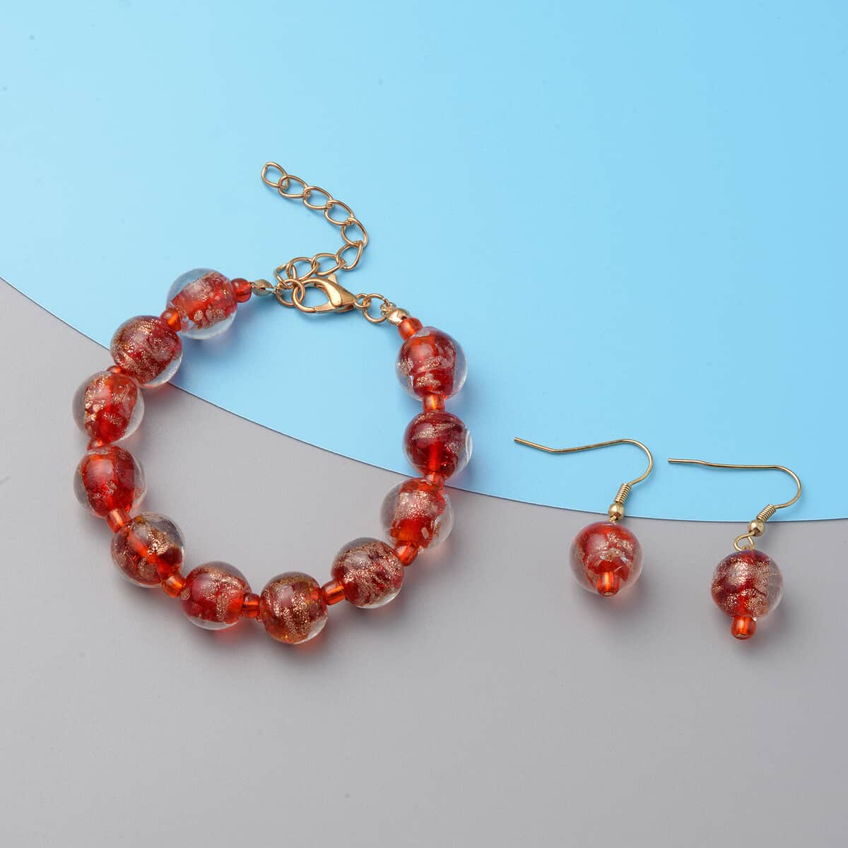 Red Color Murano Style, Simulated Red Diamond Adjustable Bracelet and Earrings in Goldtone image number 1