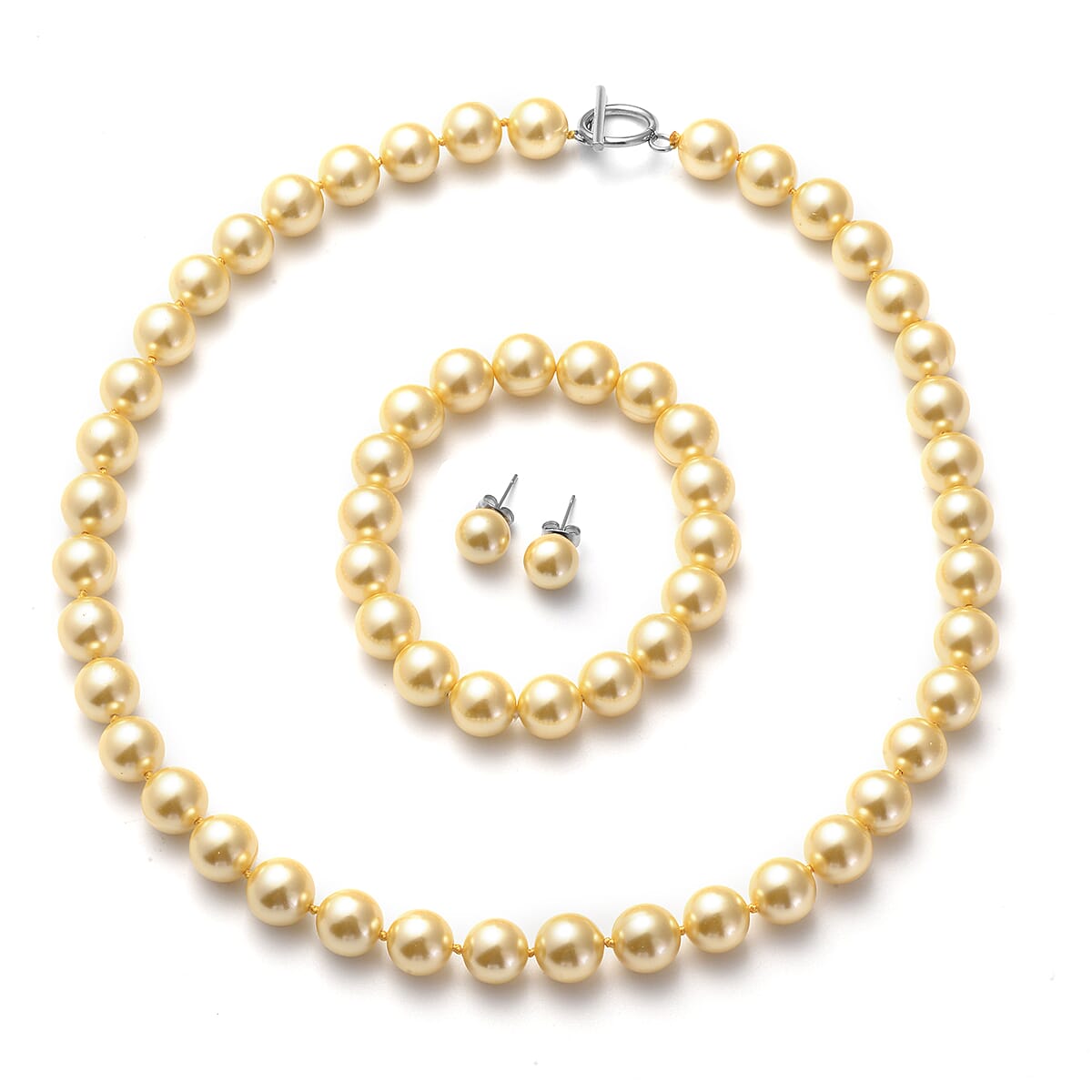 Golden Puka Shell Pearl Beaded Stretch Bracelet and Earrings and Necklace 20 Inches in Stainless Steel image number 0