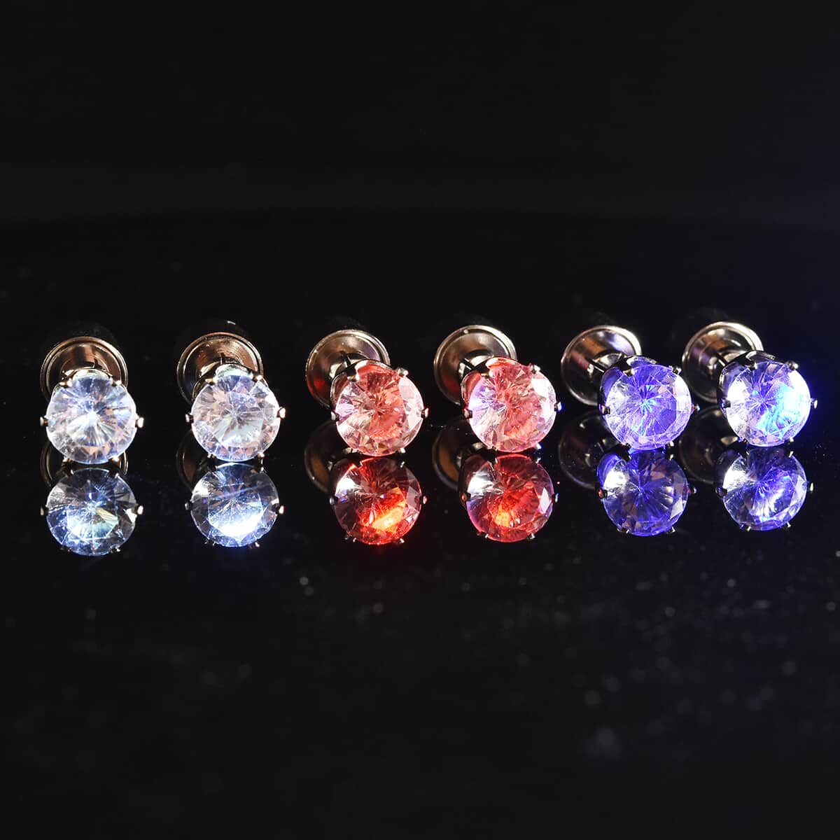 Set of 3 White Austrian Crystal White, Ruby and Sapphire Color LED Stud Earrings in Silvertone image number 1