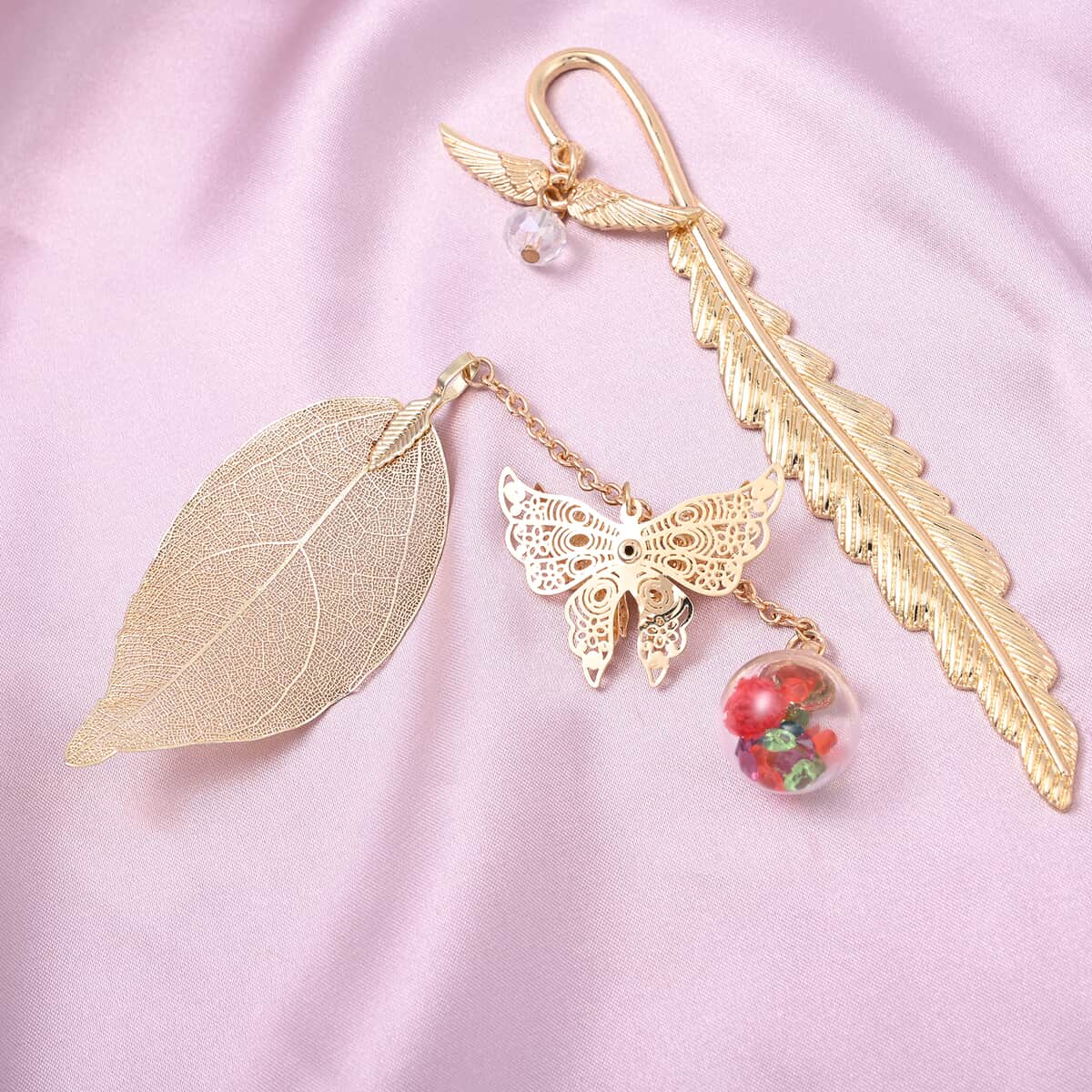 Set of 2 Multi Austrian Crystal Metallic Feather and Leaf Bookmarks in Goldtone with Angel Wing Charm, Butterfly and Dried Pressed Flower image number 1