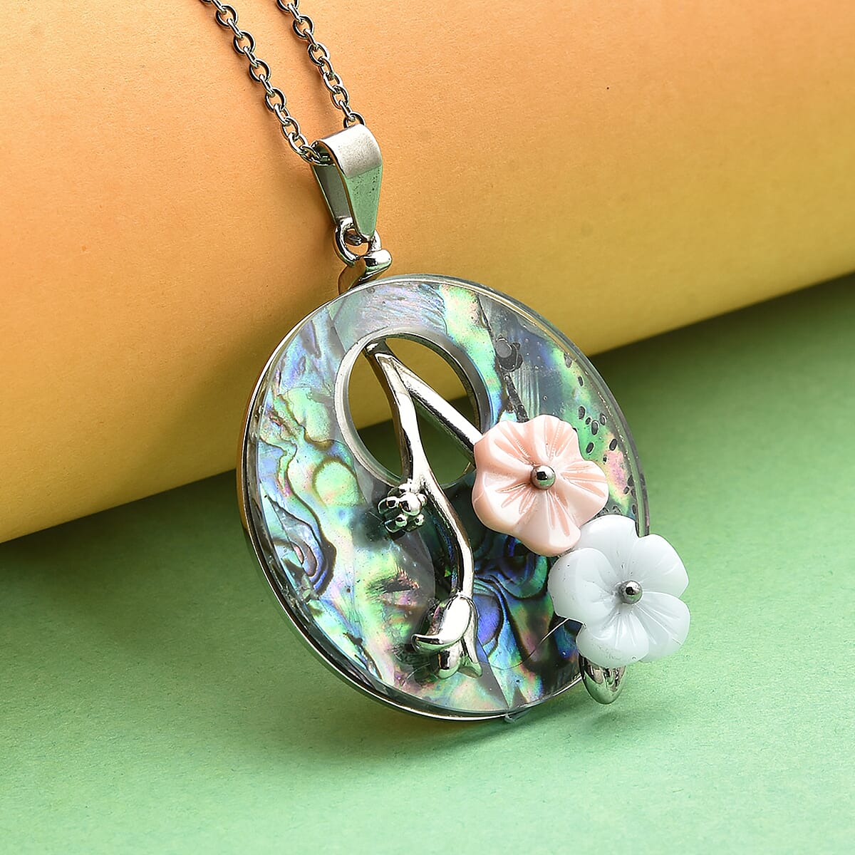 Abalone Shell, Pink Shell Pearl and Resin Flower Pendant Necklace 20 Inches in Stainless Steel image number 1