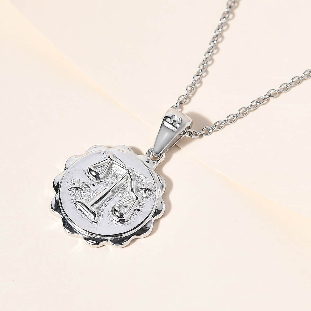 KARIS Libra Zodiac Pendant Necklace 20 Inches in Platinum Bond and Stainless Steel image number 1