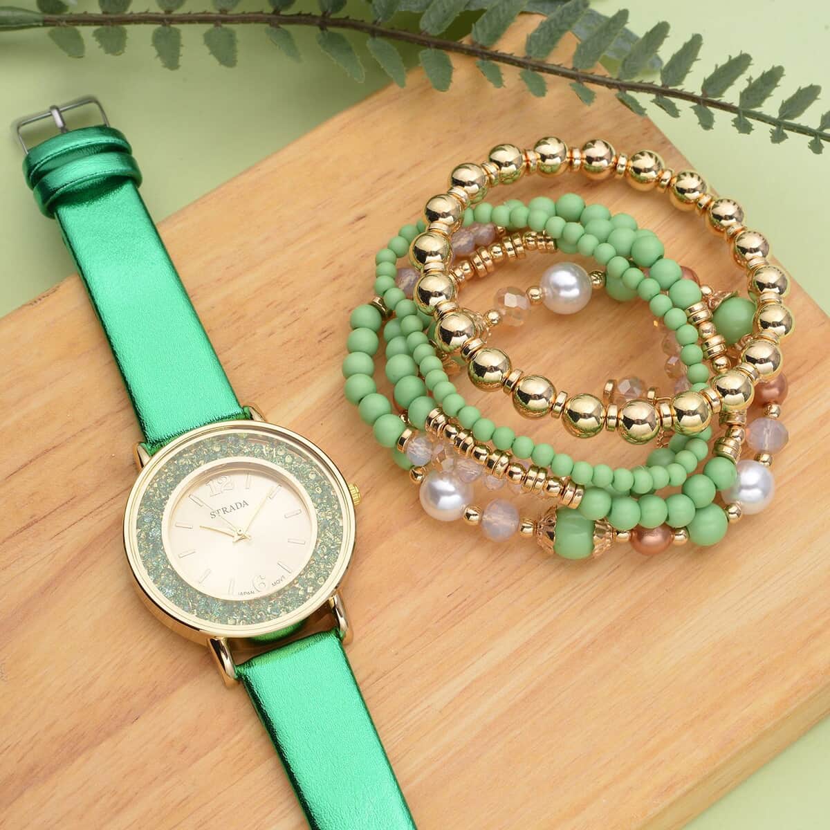 Strada Green Crystal Japanese Movement Watch with Green Faux Leather Strap (40mm) (5.25-7In) and Set of 5 Green with Multi Beaded Stretch Bracelet image number 1