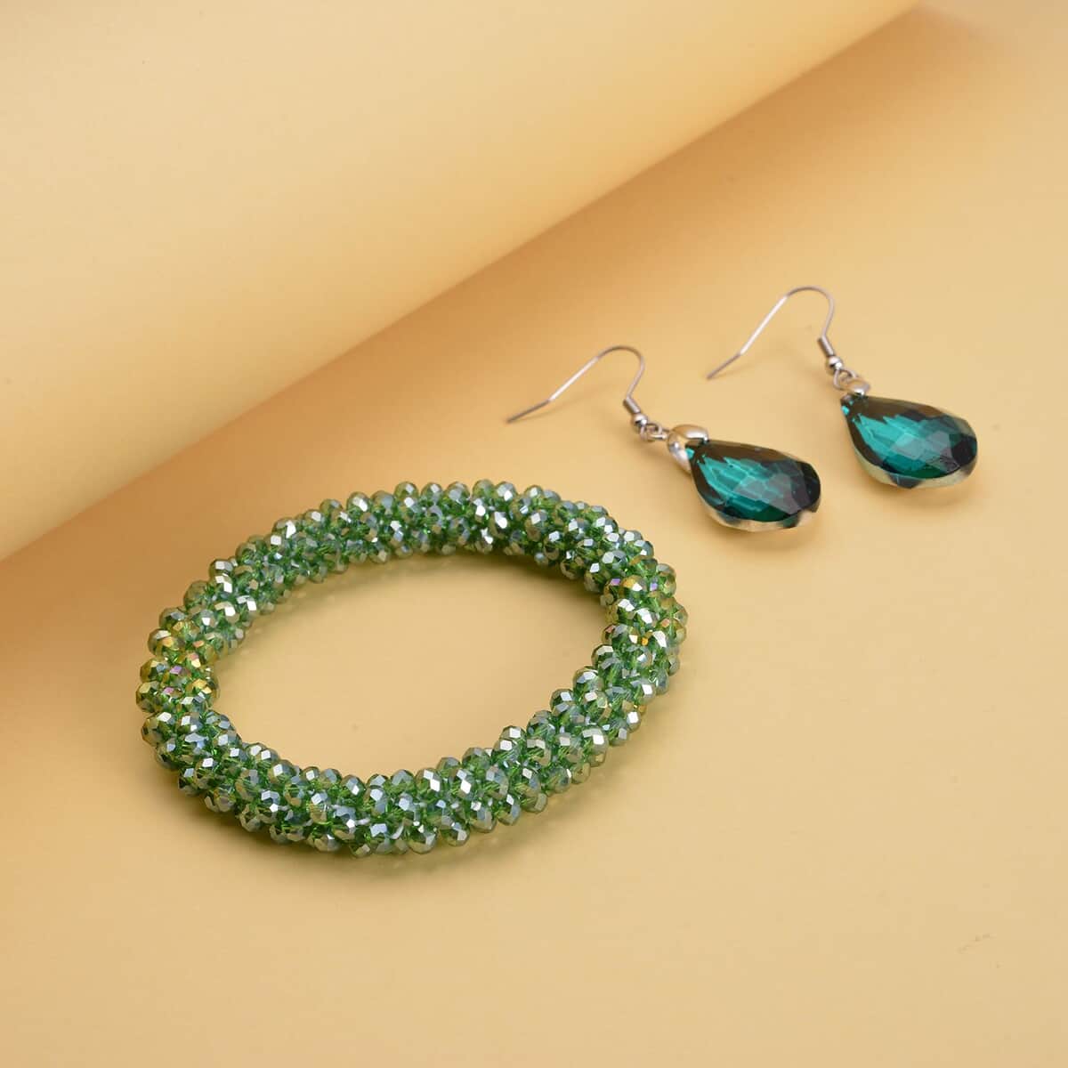 Simulated Emerald Beaded Stretch Bracelet and Drop Earrings in Silvertone image number 1