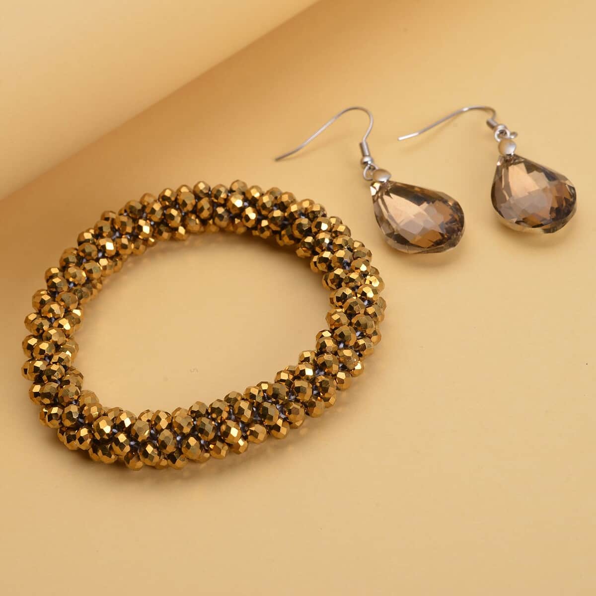 Simulated Champagne Quartz Beaded Stretch Bracelet and Drop Earrings in Silvertone image number 1