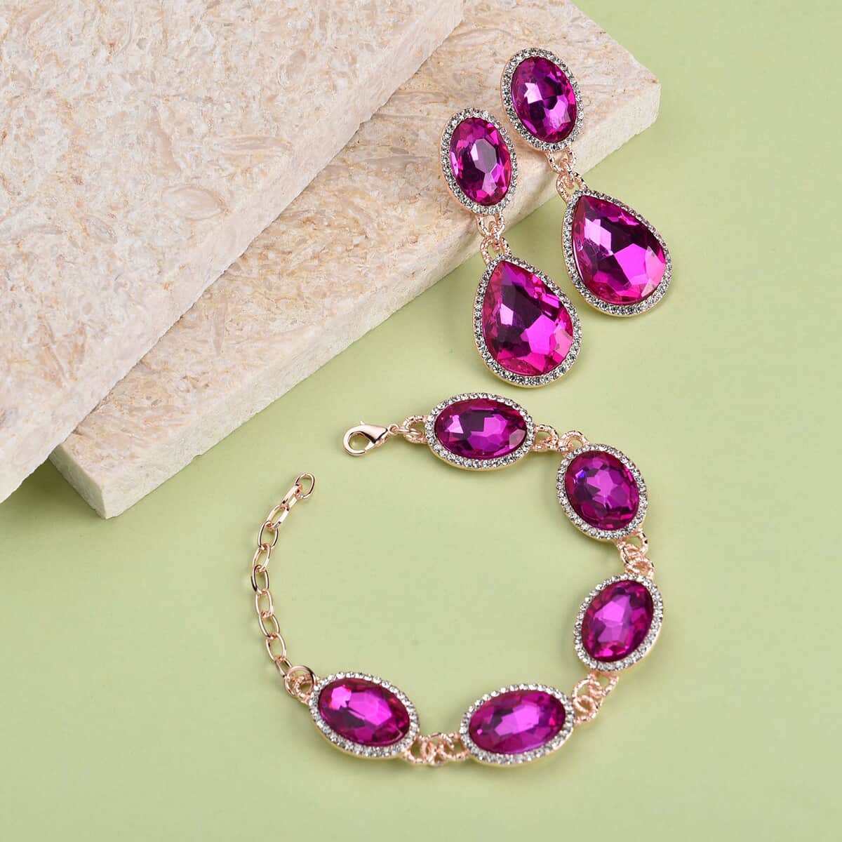 Simulated Pink Sapphire and Austrian Crystal Link Bracelet (7.0-9.0In) and Earrings in Rosetone image number 1