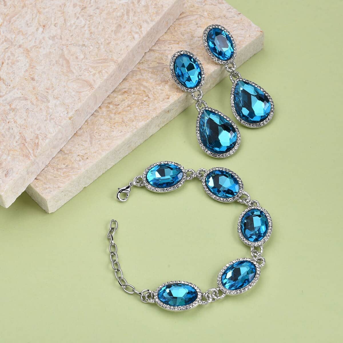 Simulated Blue Topaz and Austrian Crystal Link Bracelet (7.0-9.0In) and Earrings in Silvertone image number 1