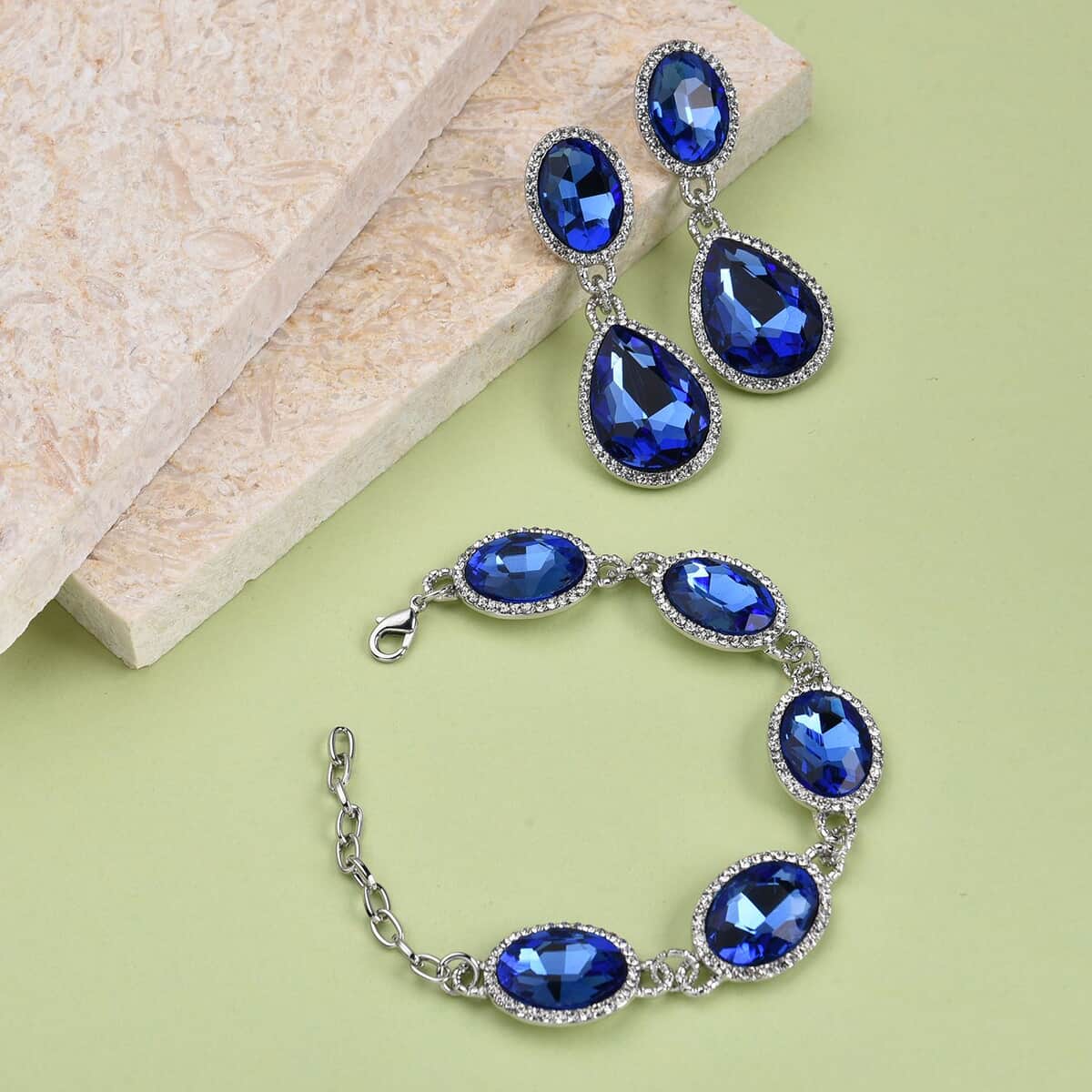 Simulated Blue Sapphire and Austrian Crystal Link Bracelet (7.0-9.0In) and Earrings in Silvertone image number 1