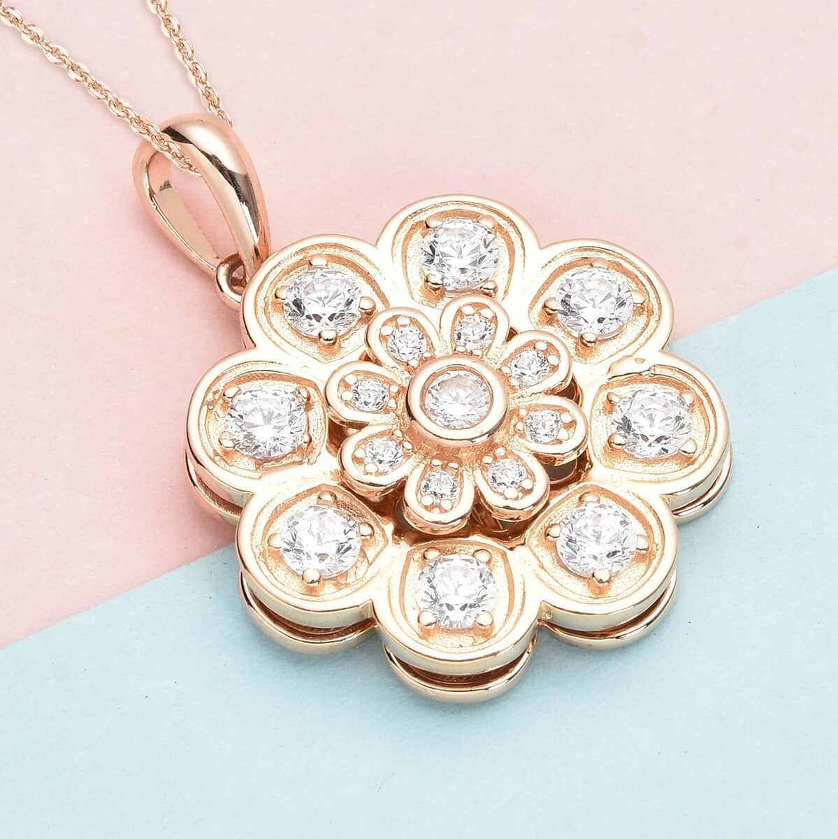 Simulated Diamond Daisy Flower Spinner Pendant in 14K Rose Gold Over Sterling Silver with ION Plated RG Stainless Steel Necklace 20 Inches 0.90 ctw image number 1