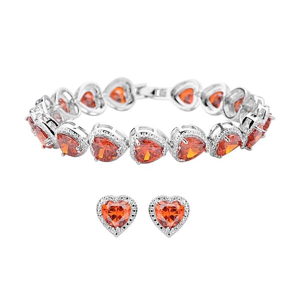 Simulated Orange Red Diamond Heart Shape Bracelet (6.50In) and Stud Earrings in Silvertone 45.00 ctw