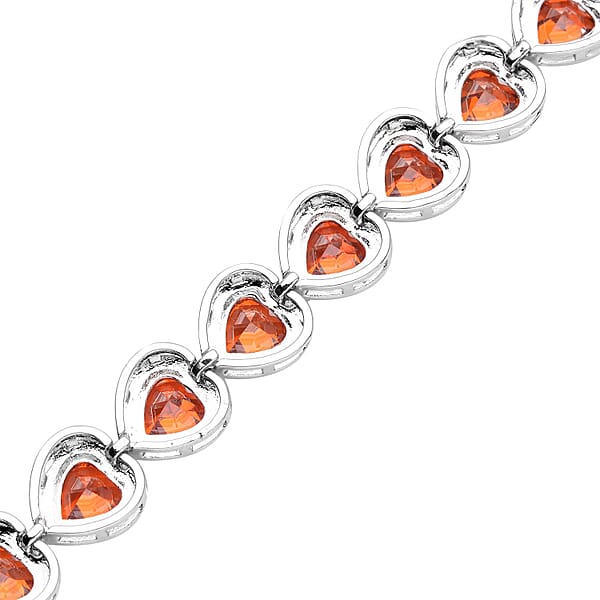 Simulated Orange Red Diamond Heart Shape Bracelet (6.50In) and Stud Earrings in Silvertone 45.00 ctw