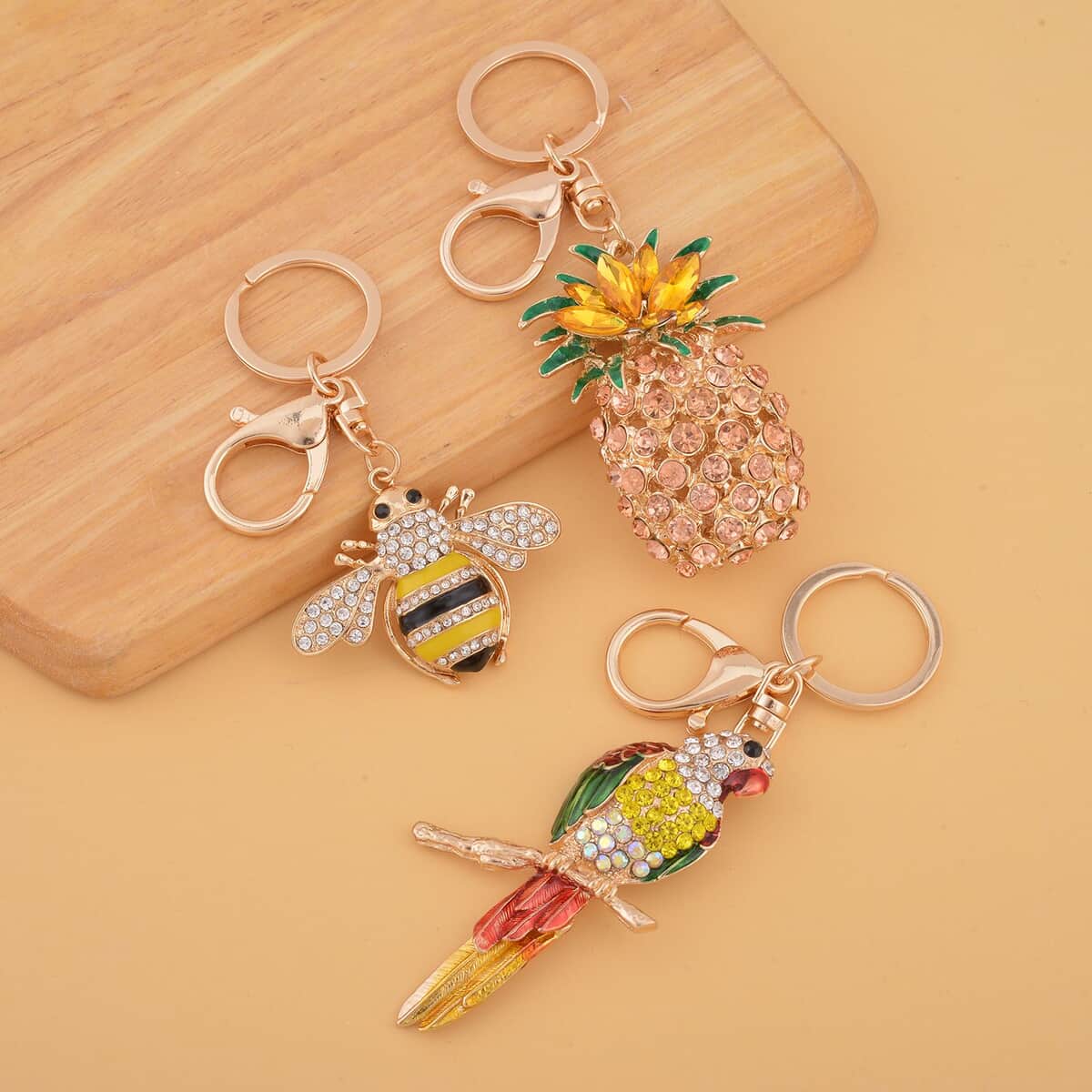 Set of 3 Multi Color Austrian Crystal, Champagne Glass, Enameled Parrot, Pineapple and Bee Keychain in Goldtone, Cute Keychains, Key Holders, Key Rings, Cool Keychains image number 1