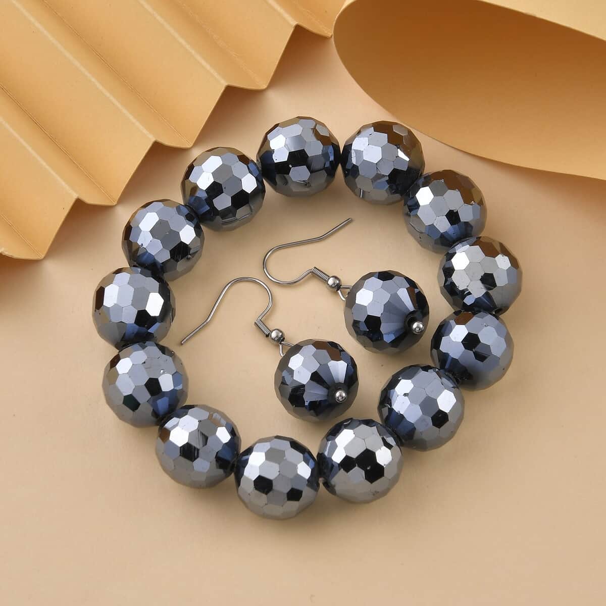 Hematite Color Glass Beaded Stretch Bracelet and Dangle Earrings in Stainless Steel image number 1