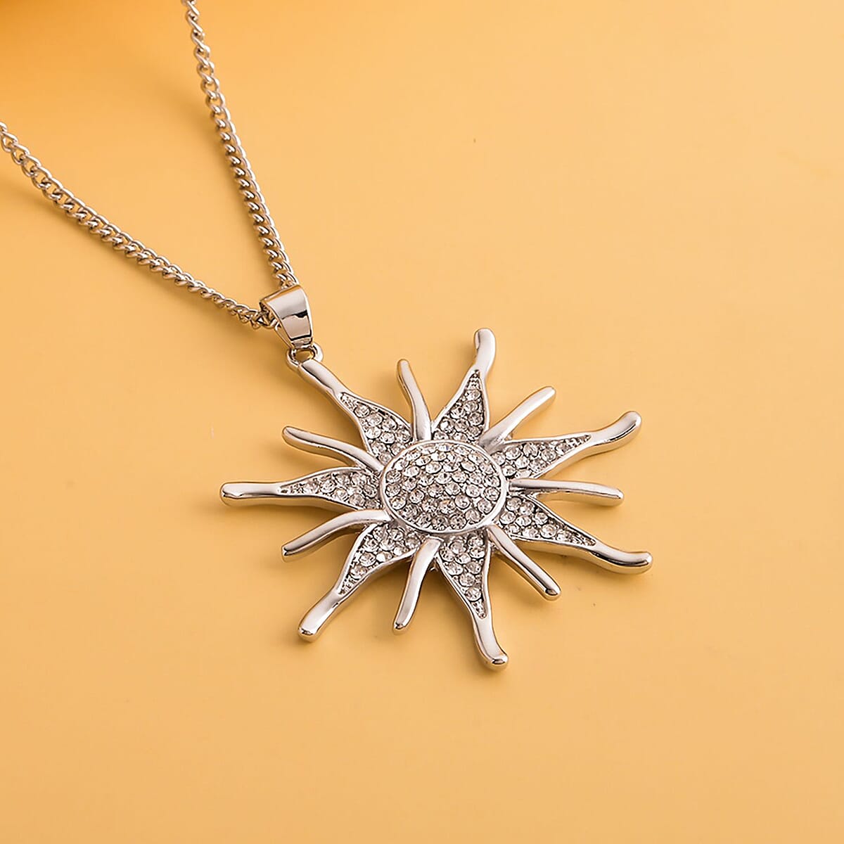 Austrian Crystal Sunburst Pendant Necklace 29-31 Inches in Silvertone image number 1