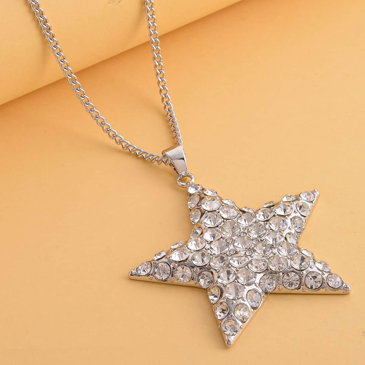 White Austrian Crystal Star Pendant Necklace 29-31 Inches in Silvertone image number 1