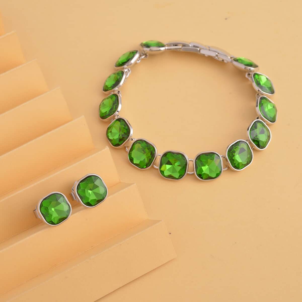 Simulated Emerald Tennis Bracelet (7-8In) and Stud Earrings in Silvertone image number 1