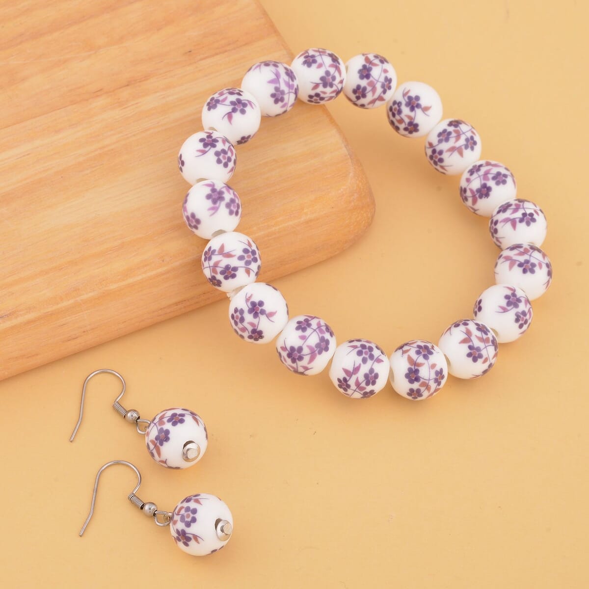 Purple Flower Ceramic Beaded Stretch Bracelet and Earrings in Stainless Steel 246.00 ctw , Tarnish-Free, Waterproof, Sweat Proof Jewelry image number 1
