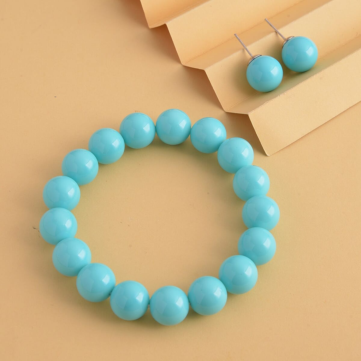 Turquoise Blue Shell Pearl 11-13mm Stretch Bracelet and Stud Earrings in Stainless Steel , Tarnish-Free, Waterproof, Sweat Proof Jewelry image number 1