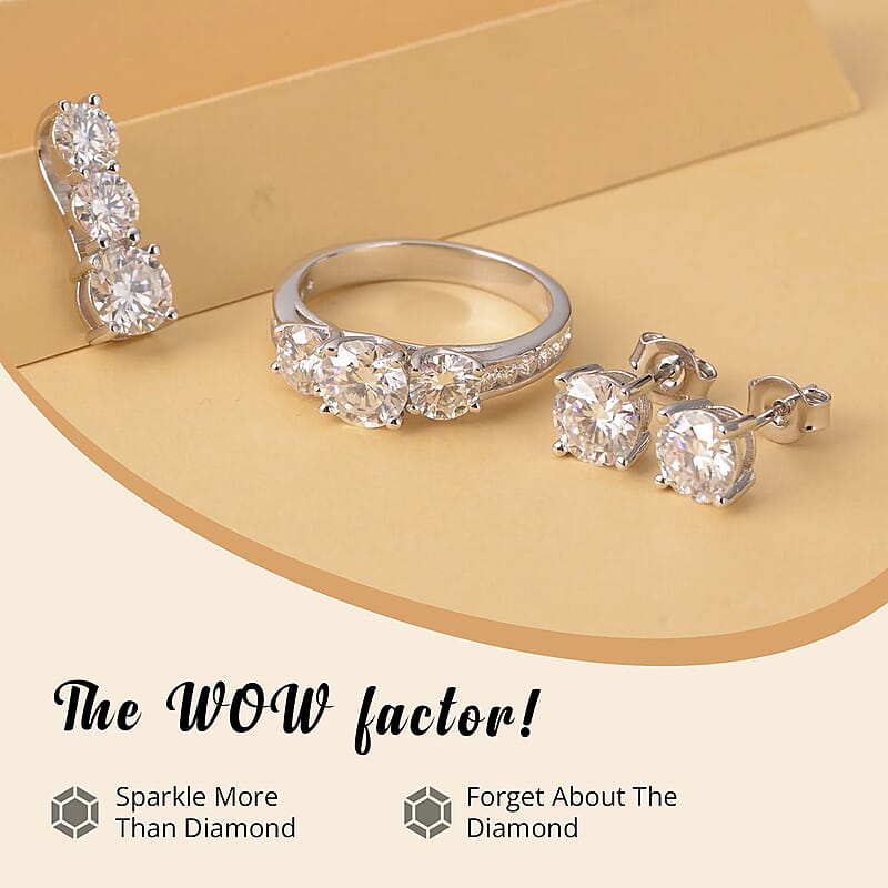 120 Facet Moissanite Trilogy Ring (SIZE 5.00) Stud Earrings and Pendant in Rhodium Over Sterling Silver 6.20 ctw