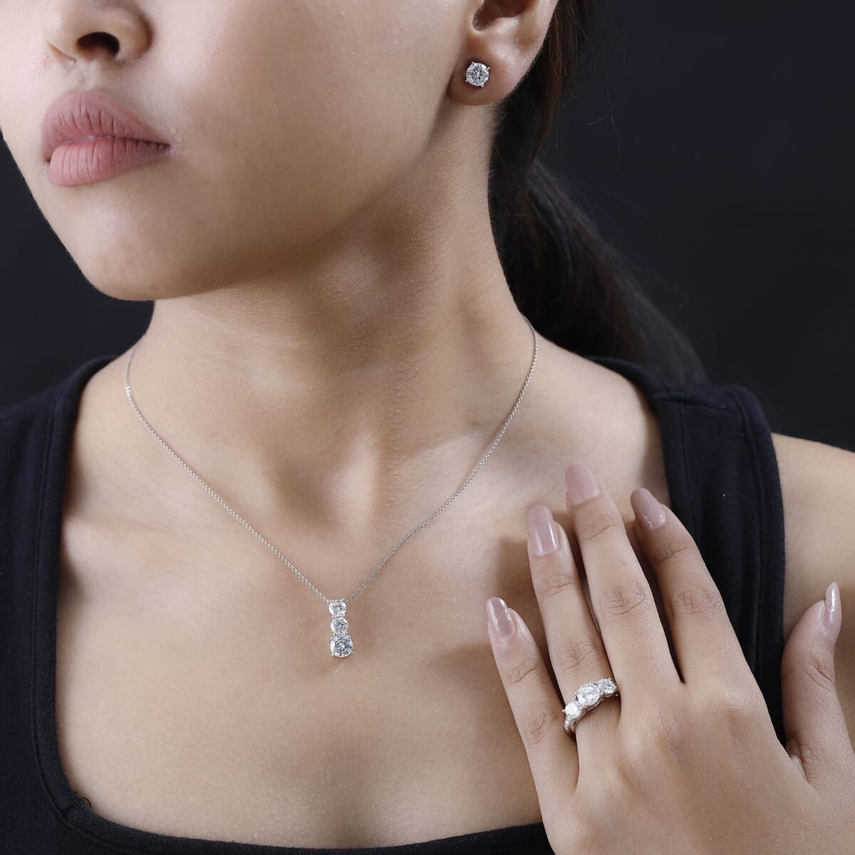 120 Facet Moissanite (Rnd 6.5mm) Trilogy Ring (Size 10.0), Pendant and Stud Earrings Jewelry Set For Women in Rhodium Over Sterling Silver 6.20 ctw image number 2