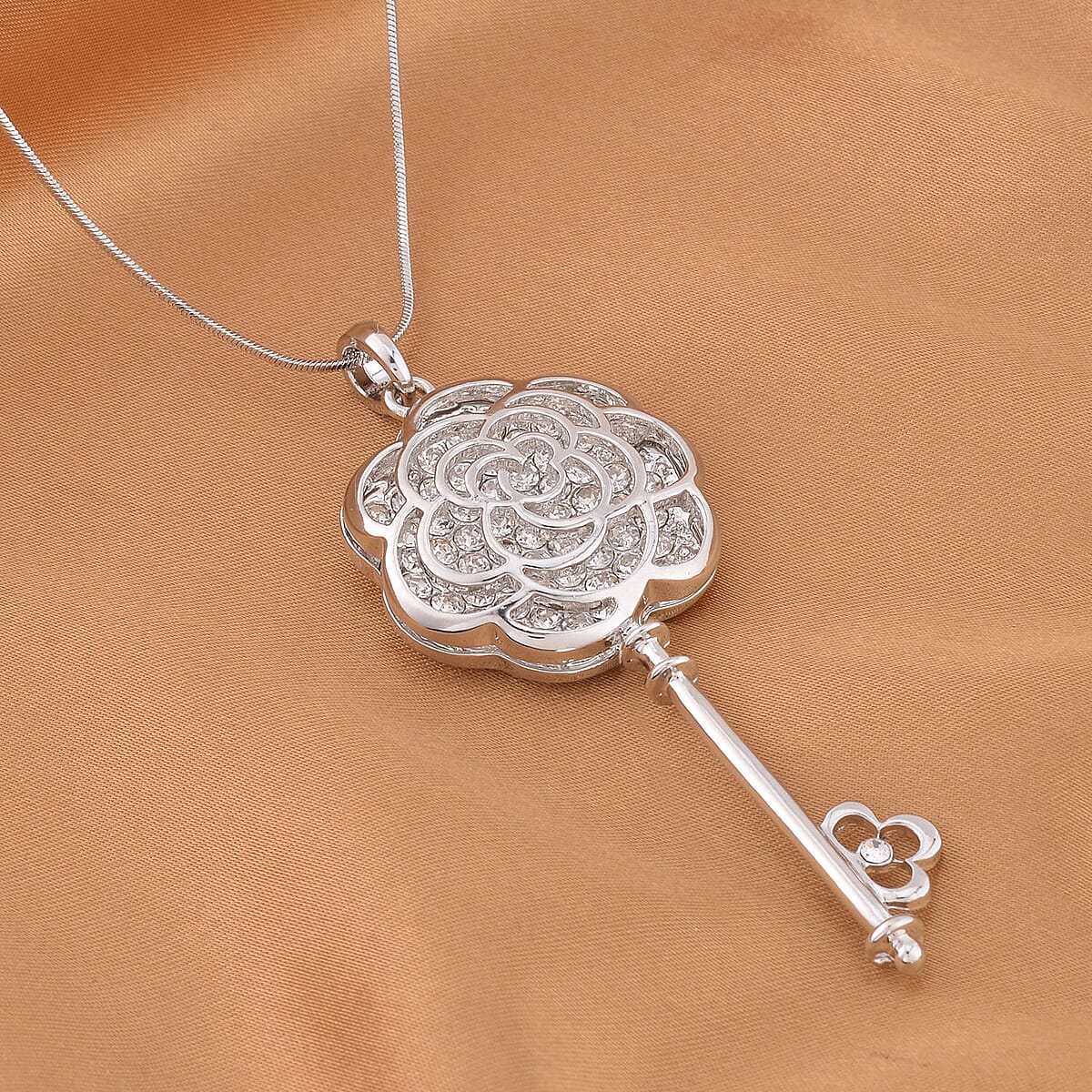 Austrian Crystal Flower & Key Shaped Pendant Necklace 20-30 Inches in Silvertone image number 1