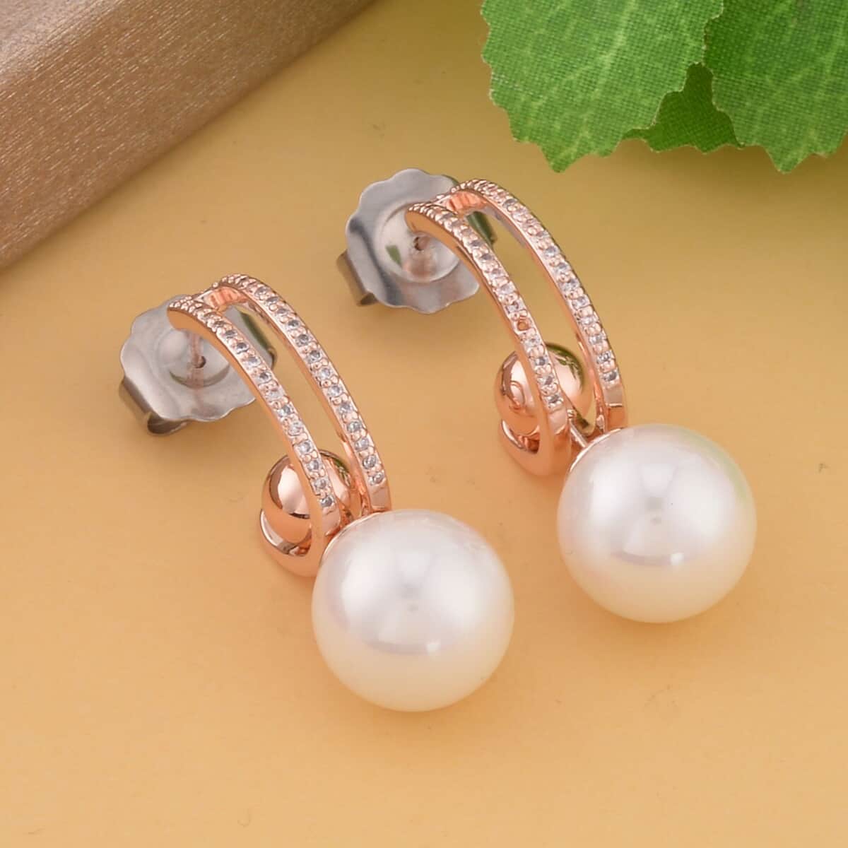 Set of 2 White Shell Pearl and Simulated Diamond Multi Ways Wearable Earrings in Rosetone image number 1