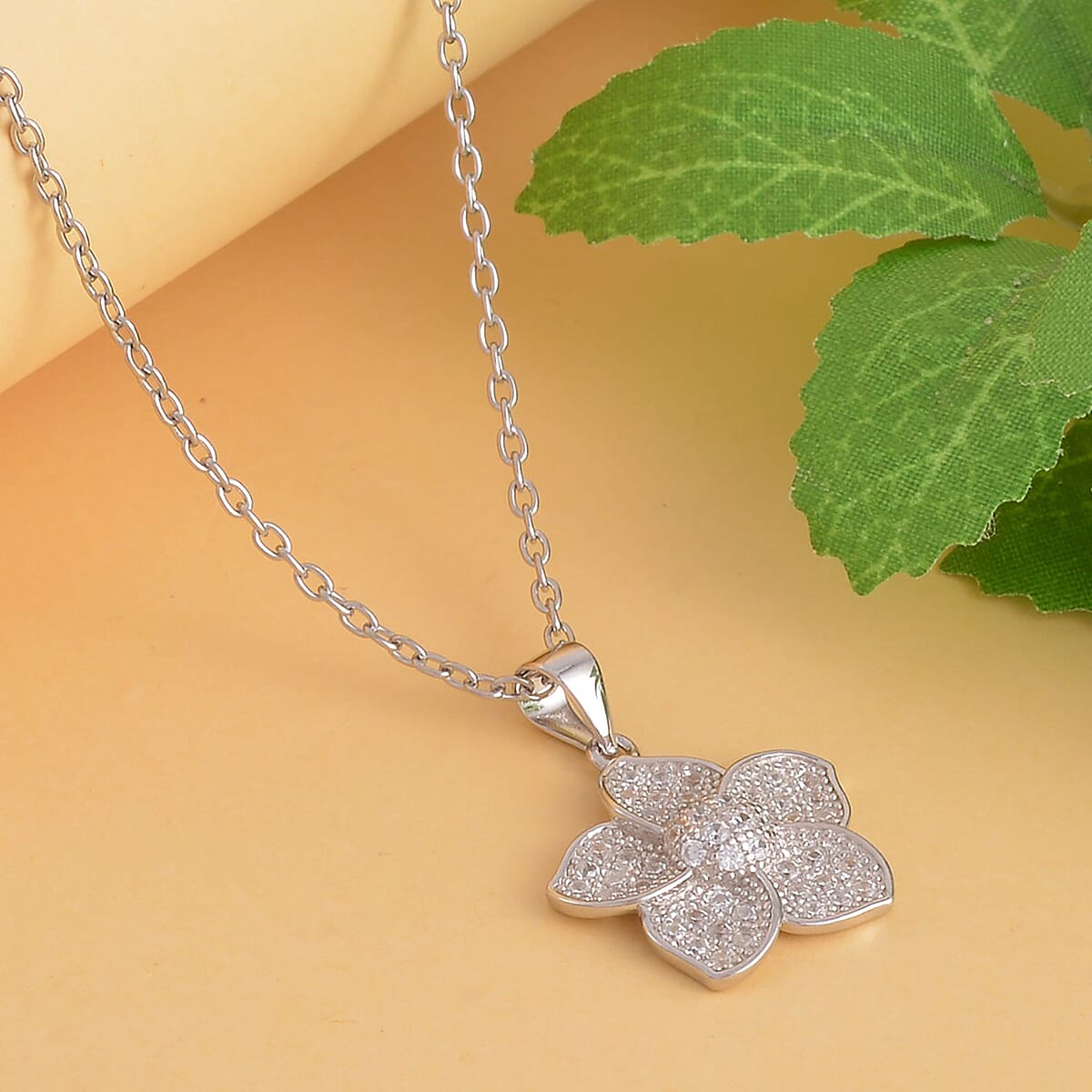 Simulated Diamond Flower Pendant in Rhodium Over Sterling Silver with Stainless Steel Necklace 20 Inches image number 1