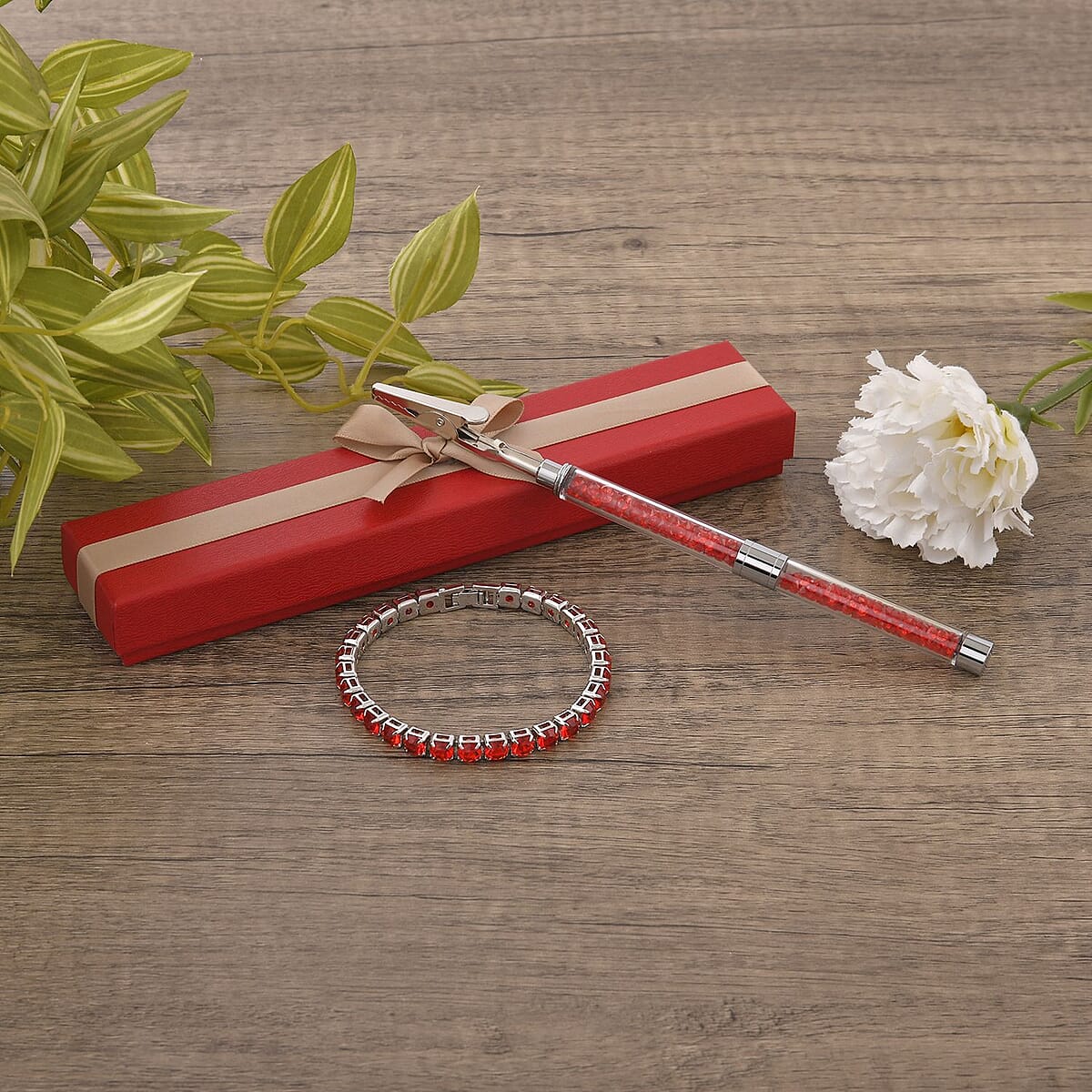 Doorbuster Red Austrian Crystal Tennis Bracelet (7.50In) and Bracelet Helper in Silvertone image number 1