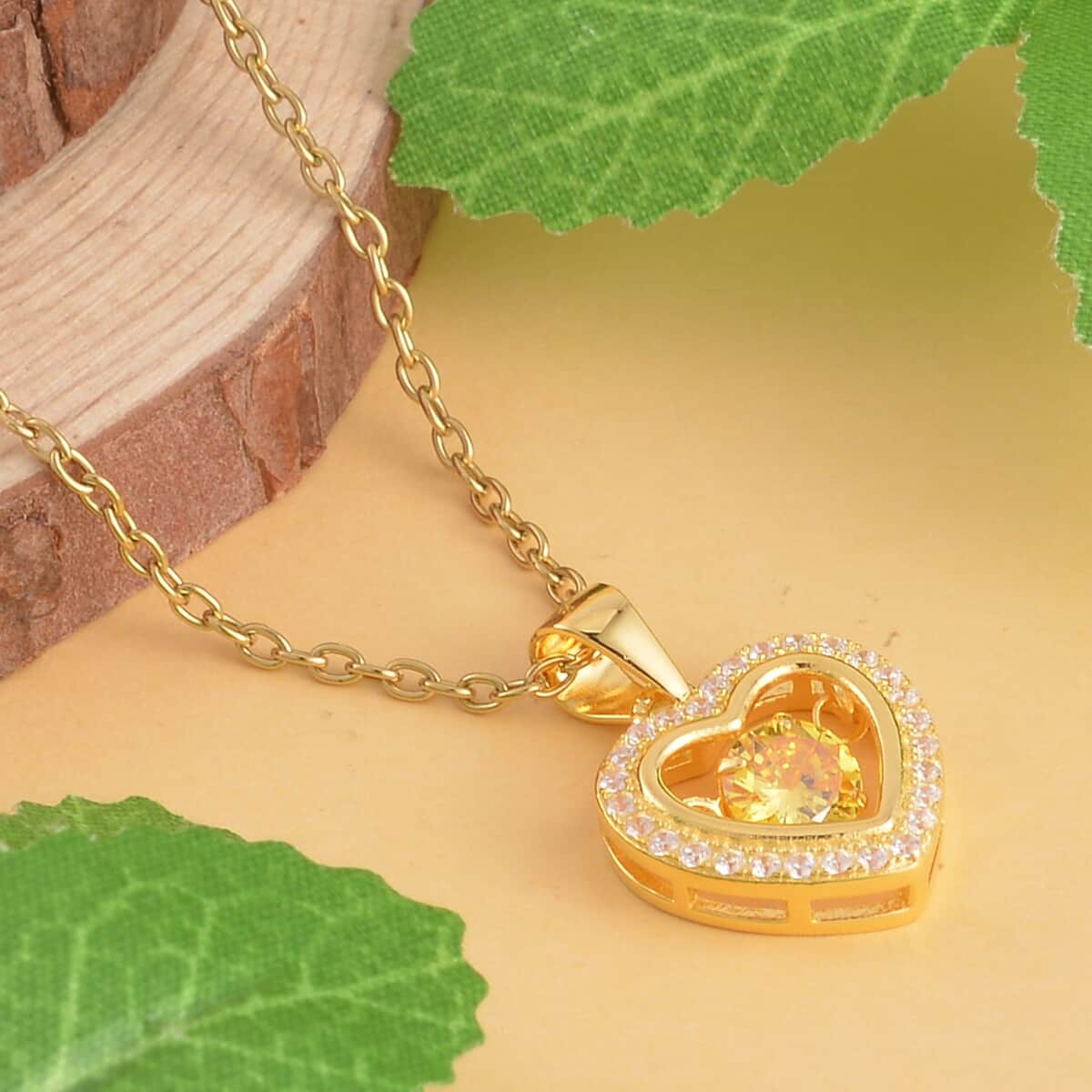 Simulated Yellow and White Diamond Heart Shape Dancing Pendant in 14K Yellow Gold Over Sterling Silver with ION Plated YG Stainless Steel Necklace 20 Inches 1.00 ctw image number 1