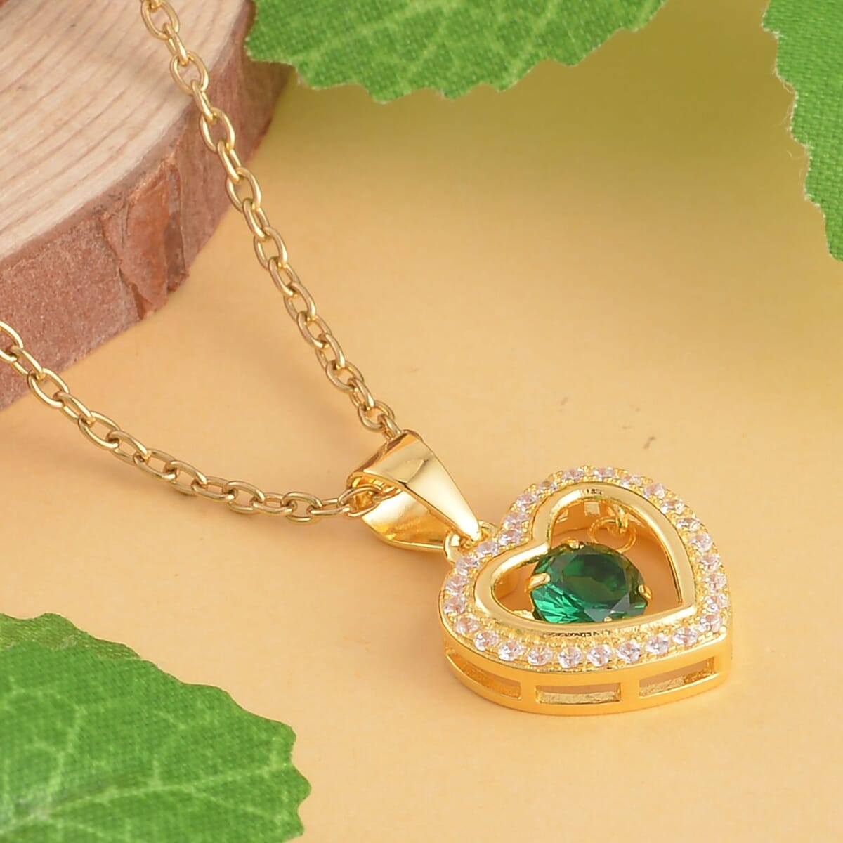 Simulated Green and White Diamond Heart Shape Dancing Pendant in 14K Yellow Gold Over Sterling Silver with ION Plated YG Stainless Steel Necklace 20 Inches 1.00 ctw image number 1