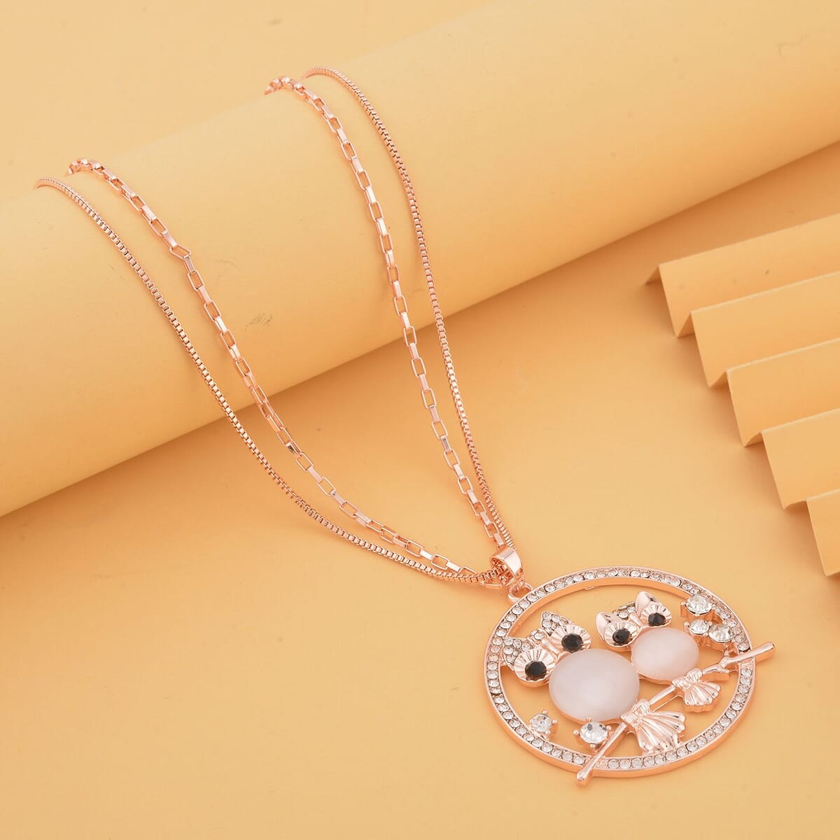 Lab Created White Cat's Eye and White and Black Austrian Crystal Owl Pendant Necklace 28-30 Inches in Rosetone image number 1