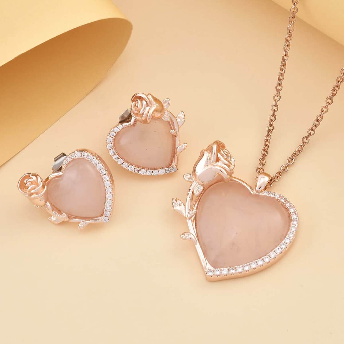 Galilea Rose Quartz, Simulated Diamond Heart Earrings and Pendant Necklace 20-22 Inches in Rosetone 6.00 ctw image number 1