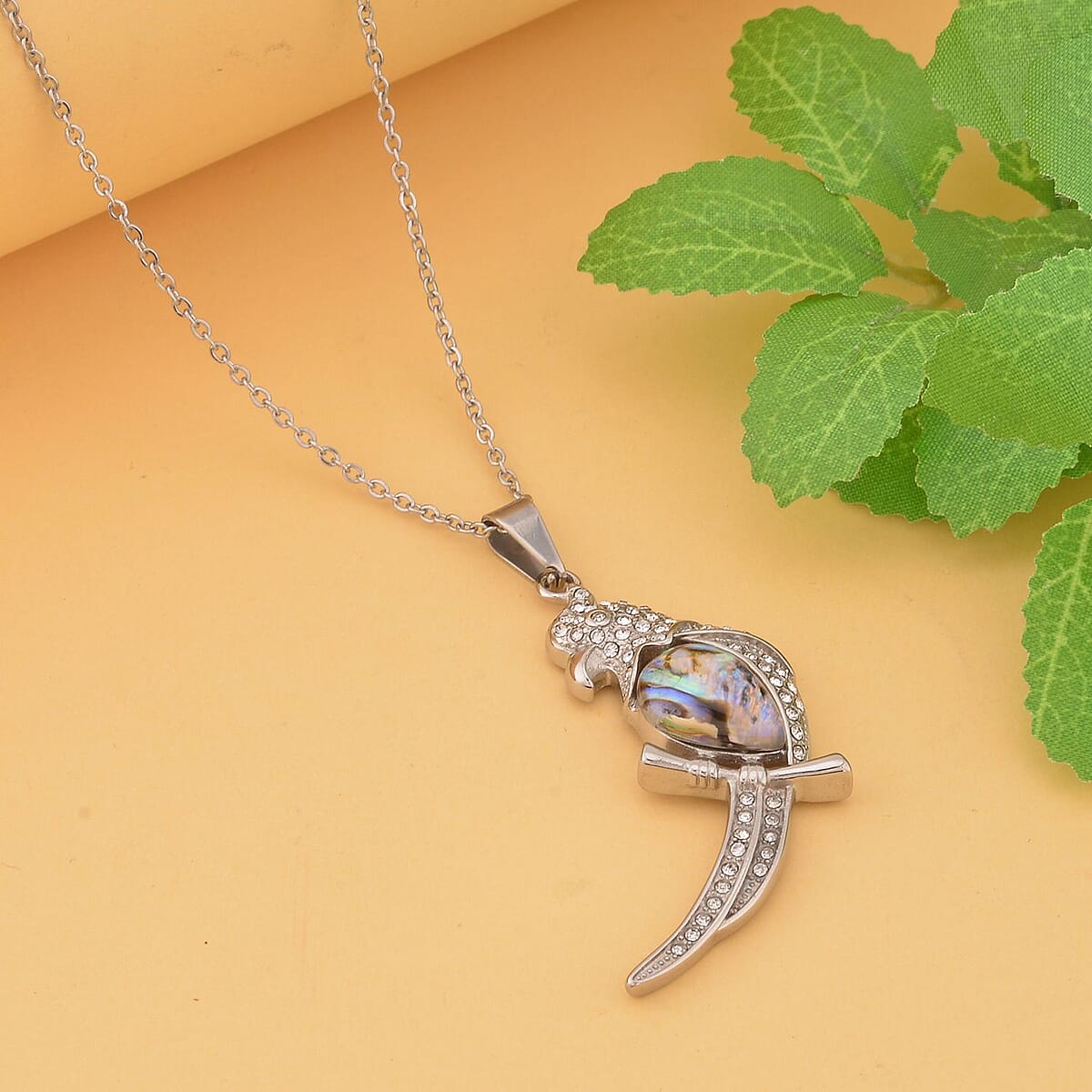 Abalone Shell, White and Black Austrian Crystal Parrot Pendant Necklace 20 Inches in Stainless Steel image number 1