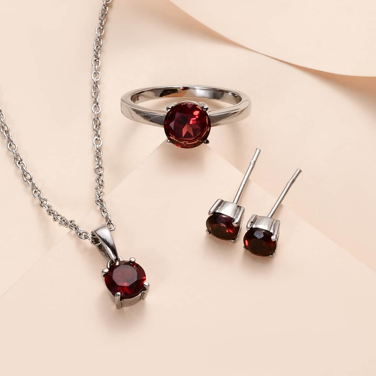 Mozambique Garnet Solitaire Stud Earrings, Ring (Size 10.0) and Pendant Necklace (20 Inches) in Stainless Steel 3.75 ctw | Tarnish-Free, Waterproof, Sweat Proof Jewelry image number 1