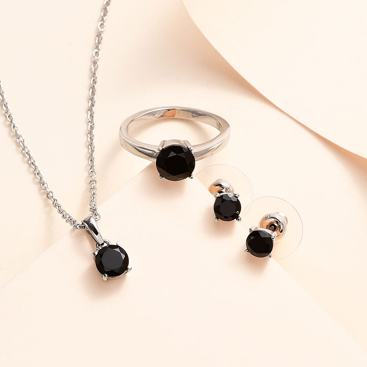 Thai Black Spinel Solitaire Stud Earrings, Ring (Size 7.0) and Pendant Necklace 20 Inches in Stainless Steel 3.25 ctw image number 1