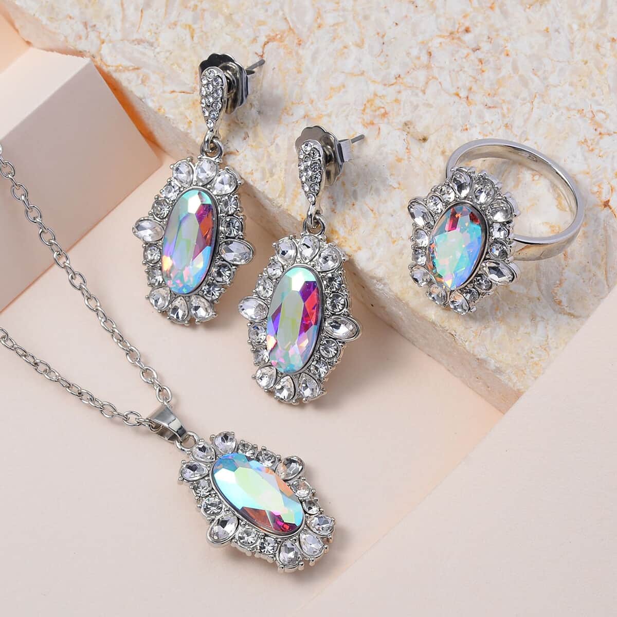 Simulated Aurora Borealis, Austrian Crystal Halo Ring (Size 6.00), Earrings and Pendant Necklace in Silvertone 20-22 Inches image number 1